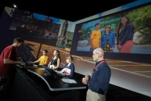 School children presenting at a conference in the US | CRC NI