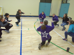 Teenagers playing basketball in wheelchairs | NICRC